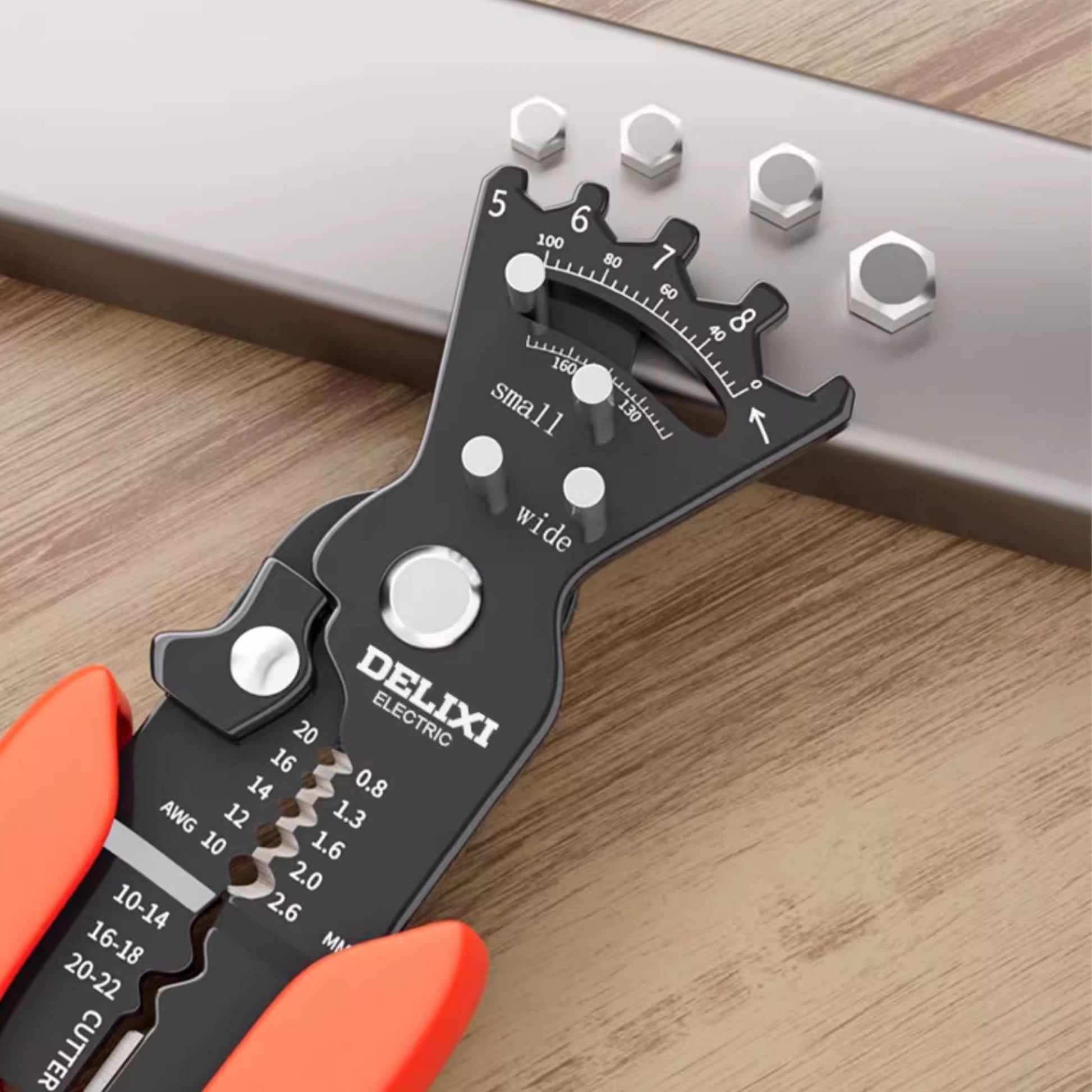 The bolt shearing function of the Delixi 5-in-1 pliers, showing the threaded holes for cleanly cutting screws and bolts